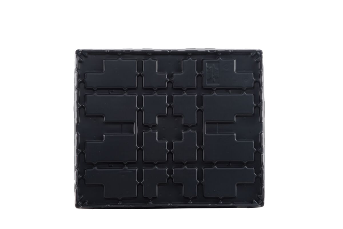 A black plastic pallet with a pattern on it.