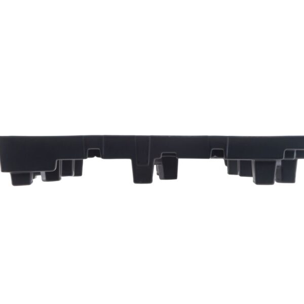 A black coffee table with black squares on a white background, made of plastic pallets.