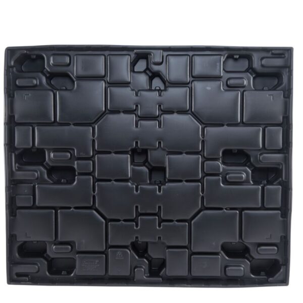 A black plastic pallet with multiple squares on it.