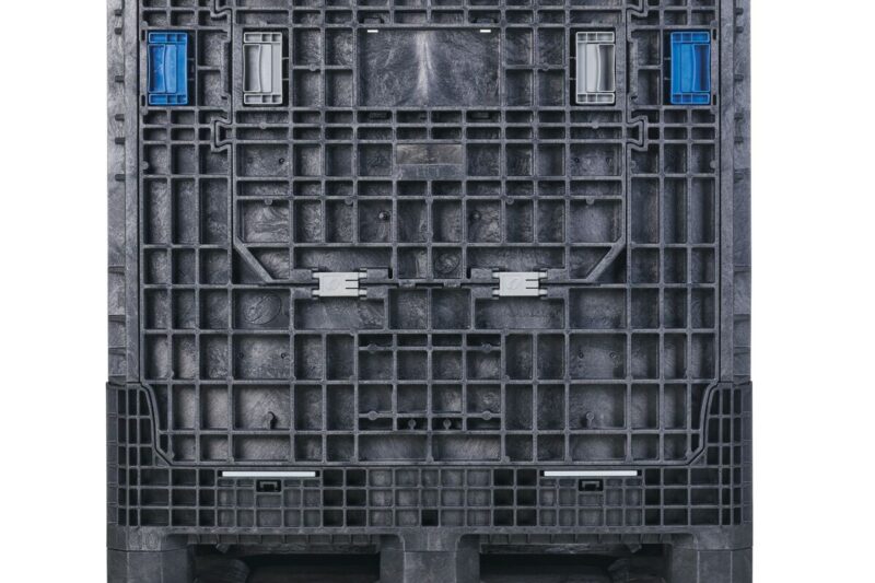 GP4048-39_SS_BLACK The GP4048-39 is a large black industrial plastic pallet box featuring a grid pattern, blue latches, and reinforced corners, shown from the side.