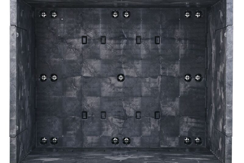 GP4048-39_TOP_BLACK A top-down view of the GP4048-39, an empty rectangular industrial gray storage container featuring a textured interior and multiple screw connectors on its floor and walls.
