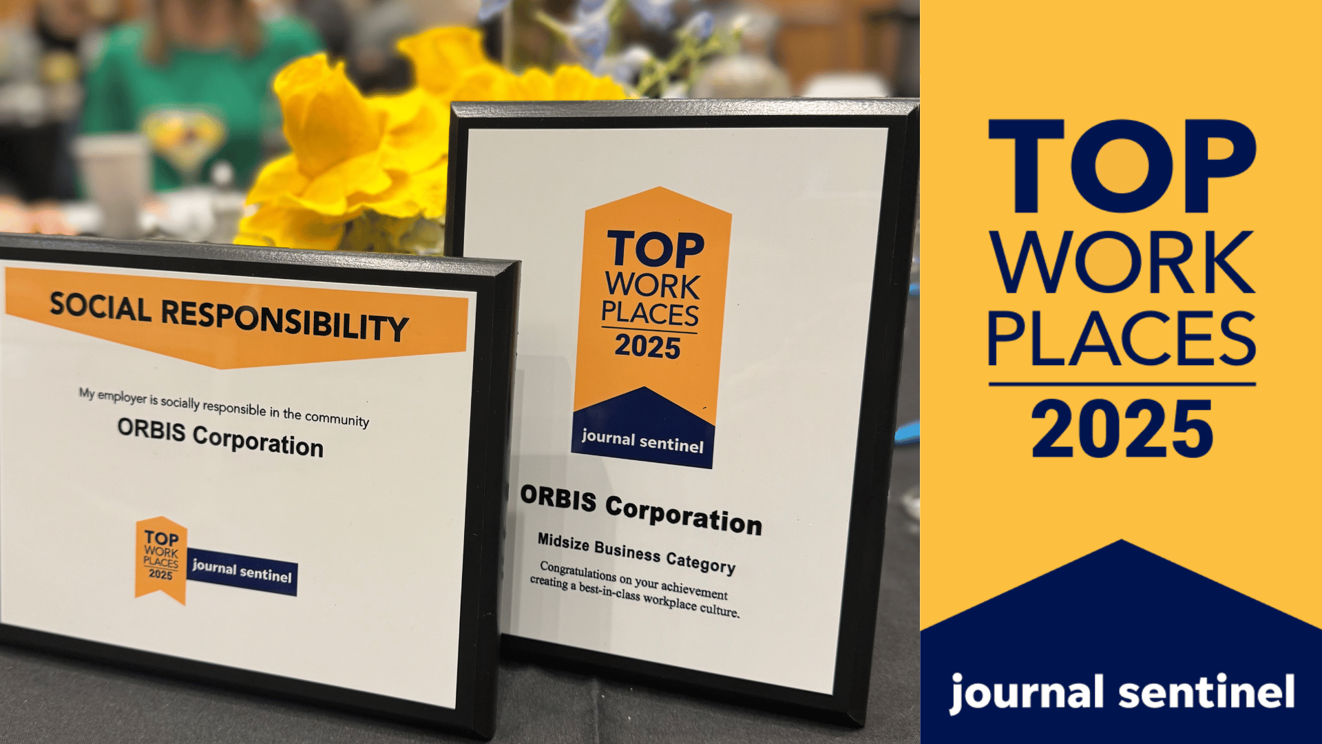 Two framed awards on a table recognize ORBIS Corporation for Social Responsibility and as a 2025 Top Workplace, with a bouquet of yellow flowers in the background.