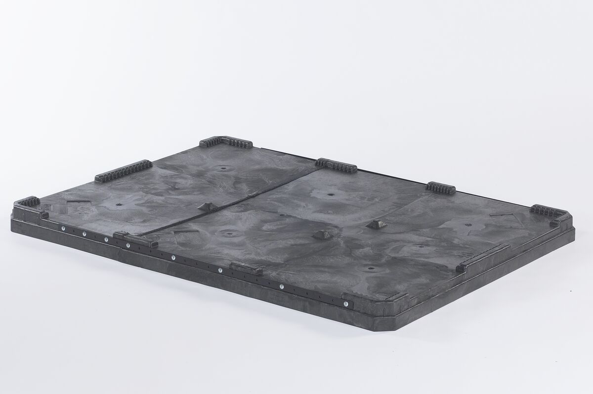 The CHDRT6548 black plastic lid for 65x48 bulk container on white background
